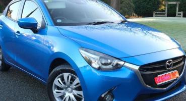 Mazda Demio - The Compact and Fun Hatchback with Skyactiv Technology, i-Stop System, and Rear Spoiler